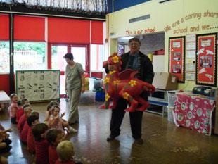 Superdragon leaving Caerleon
Lodge Hill Infant School with Councillor Charles Ferris to make its journey to the Dragons Den.