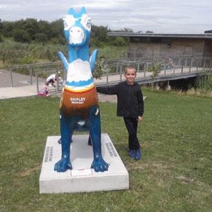 Our son Luke Johnson standing next to number 54 Shipley which near the Visitor Centre at the Wetlands reserve from Greg Johnson.