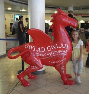 My daughter Lucy with the touring dragon, Evan James in the Visit Britain Tourist Information Office, Regent Street, London