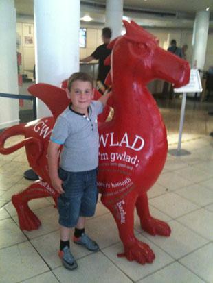 My son Jack with the touring dragon Evan James in London..He only has 1 dragon to mark off on his map now...