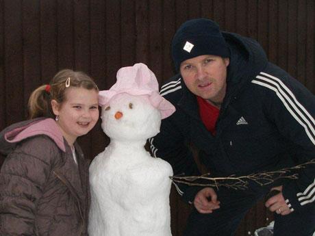 Sean and Rhian Edwards with their snowman.