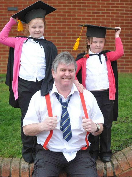 Ringland Primary teacher John White with Morgan Ewens and Madison Ewens
