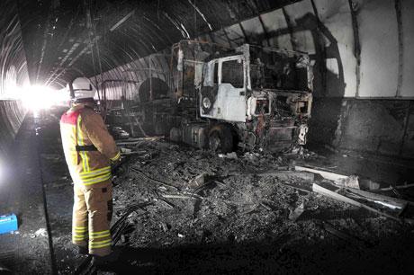 WRECKED: The remains of the lorry which caused extensive damage to the tunnel when it exploded yesterday. Pic: Malcolm Morgan