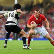 Adam Warren in action for Wales against the Barbarians