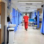 Patients are being kept in hospital due to a social care crisis, according to a Senedd committee report.