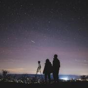 Silhouettes looking at the stars. Credit: Yuting Gao from Pexels