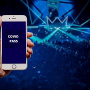 Composite image showing a mock-up Covid Pass on a phone. People visiting nightclubs and some larger events in Wales will need to show a Covid Pass to enter. Original pictures: Pexels