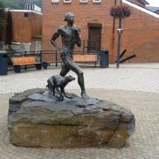 The statue of Guto Nyth Bran that stands in Mountain Ash town centre