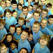 SWA MIKE LEWIS 27 1 12 REPORTER RUTH
HAPPY FACES CHILDREN OF MONNOW PRIMARY SCHOOL MEET COMEDIAN RHOD GILBERT