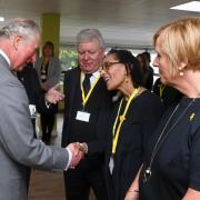 Suzanne Packer (centre, meeting then-Prince Charles) will star in The Women of Llanrumney)