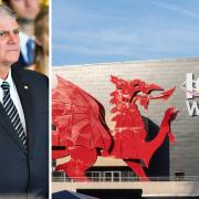 Left: American Evangelical preacher Franklin Graham. Right: the ICC Wales dragon in Newport.  Photo: Steve Pope Fotowales