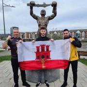 READY TO GO: Luke Pearce, Craig Woodruff and Johan Berendjy at the David Pearce statue in Newport