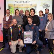 Pride in the Port celebrate their Diversity in the Community Award with Monmouthshire Building Society’s Eve Wilkins, far right