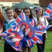 Youngsters fly the flag at the Tone Close royal wedding party, Bettws