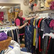 Emma Hacker, shop manager, makes sure everything looks tidy. Picture: DBPR