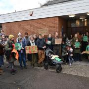 Around 40 parents gathered outside Mr Davies' office in Usk on Friday to protest for a ceasefire