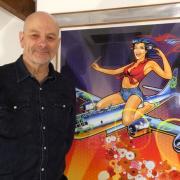 Brett Breckon with his print titled 'Revenge of the Fifty Foot Hippy'