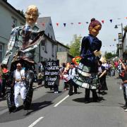 Giant puppets during a previous World Heritage Day parade in Blaenavon.
