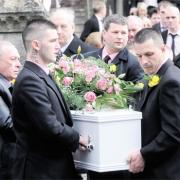 FAREWELL: Nikitta Grender’s coffin is carried from St Andrew’s Church