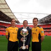 WEMBLEY WAY: County manager Justin Edinburgh with players Sam Foley, left and Gary Warren with the FA Trophy at Wembley