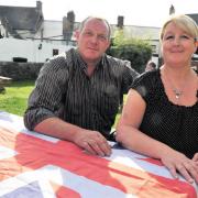 CELEBRATION: Landlady Angela Jones with husband Adrian at the Red Lion in Caerleon
