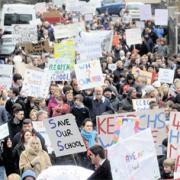 MARCH: Protesters marched through Cwmcarn to the school recently to demand Caerphilly council reopen the site