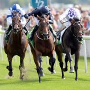 Declaration of War ridden by Joseph O'Brien (centre) beats Al Kazeem ridden by James Doyle (left) and Trading Leather ridden by Kevin Manning to win the Juddmonte International Stakes (PA Wire)