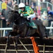 AWAY AND GONE: At Fishers Cross and AP McCoy jump the last clear of the field at Aintree