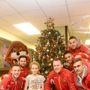GREAT DAY: Here I am visiting young patient Georgia Jones at the Royal Gwent Hospital along with Spytty the Dog, Max Porter, Andy Sandell, Christian Jolley and Lenny Pidgeley