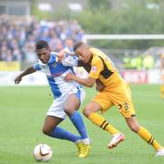 SEVERNSIDE DERBY: Christian Jolley tackles Ellis Harrison in our win over Bristol Rovers in August
