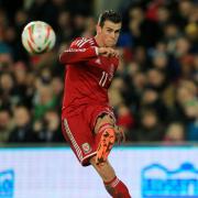 Wales' Gareth Bale takes a free kick during the International Friendly at Cardiff City Stadium, Cardiff. PRESS ASSOCIATION Photo. Picture date: Saturday November 16, 2013. See PA story SOCCER Wales. Photo credit should read: Nick Potts/PA Wire
