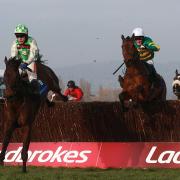 Ballynagour ridden by Tom Scudamore (left) before winning the Byrne Group Plate chase during St Patrick's Day at Cheltenham Racecourse, Cheltenham. PRESS ASSOCIATION Photo. Picture date: Thursday March 13, 2014. See PA story RACING Cheltenham. Photo c