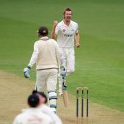 Glamorgan's Michael Hogan celebrates after taking the wicket of Surrey's Steven Davies during the LV=County Championship, Division Two match at The Kia Oval, London. PRESS ASSOCIATION Photo. Picture date: Sunday April 6, 2014. See PA story CRICKET