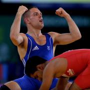 Wales' Craig Pilling celebrates his victory in the Bronze Medal Match in the FS 57kg wrestling  Category at the SECC, during the 2014 Commonwealth Games in Glasgow. PRESS ASSOCIATION Photo. Picture date: Tuesday July 29, 2014. See PA story COMMONWEALT