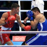 VICTORY: St Joseph's boxer Joe Cordina, left, on his way to a comfortable win over New Zealand's Chad Milnes in Glasgow