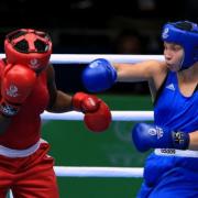 WINNER: Bargoed boxer Lauren Price, right, on her way to victory over Theresa London