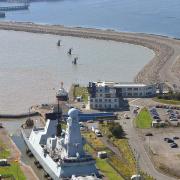 TIGHT SQUEEZE: HMS Duncan arrives at Cardiff docks