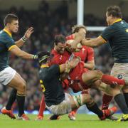 Jamie Roberts is tackled by Marcell Coetzee. (13698865)