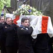 FAREWELL: The coffin of Jim Blackborow is carried into St Stephen's Church