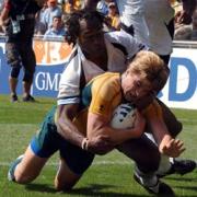 CRUISING: Australia's Drew Mitchell crosses the line for a try against Fiji
