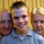 STRONGER LINKS: James Allen, 14, who helped launch the Sparkle Appeal with his mum, Linda and dad, Ronnie