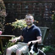 FUTURE'S BRIGHT: Ieuan Coombes, 23, with his dog Millie, is looking forward to the future after completing his degree at Cardiff Metropolitan University