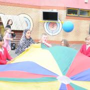 Eveswell Primary school of the week. Year 2 playing the parachute game.