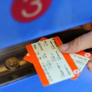 File photo dated 17/08/15 of a person buying a train ticket, as the annual rise in rail fares has been described by public transport campaigners as "another kick in the teeth" for passengers.  PRESS ASSOCIATION Photo. Issue date: Monday January