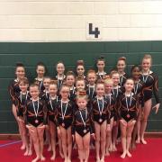 The competitive acrobatic squad from Wye Gymnastics with their latest haul of medals