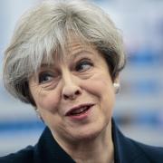 May to stay on as prime minister dispute hung parliament