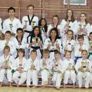 Torfaen Taekwondo Club members show off their latest medals