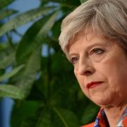 Bruised May signals Tories will seek to stay in power for sake of ‘stability’