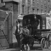 LAST DAY: Malcolm Thomas and Albert Tanner on the last horse and cart to deliver parcels from Newport station