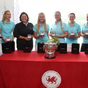 HAT-TRICK HEROES: Newport's players celebrate their third successive Welsh Ladies Team Championship